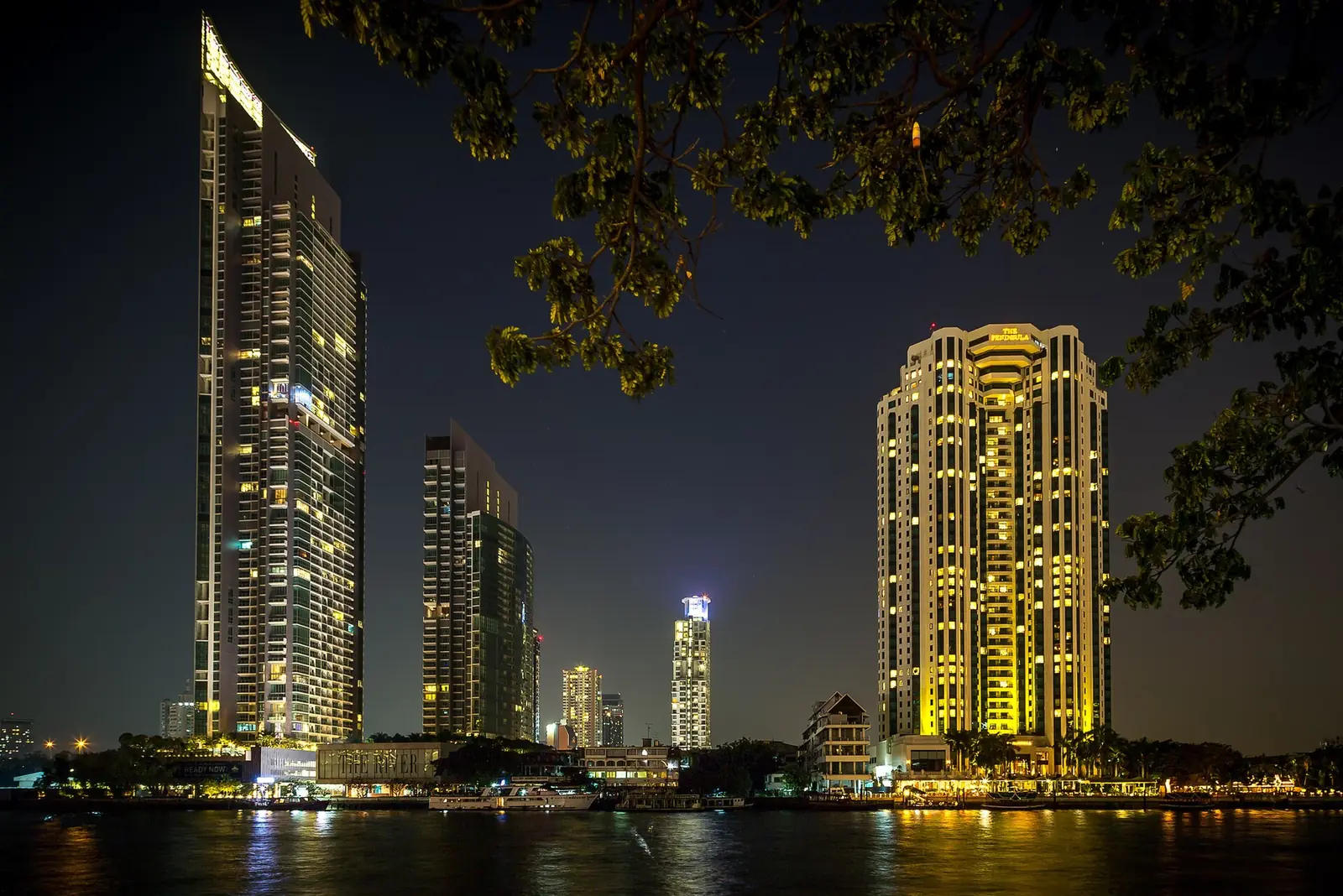 Bangkok at night along the Chao Phraya River